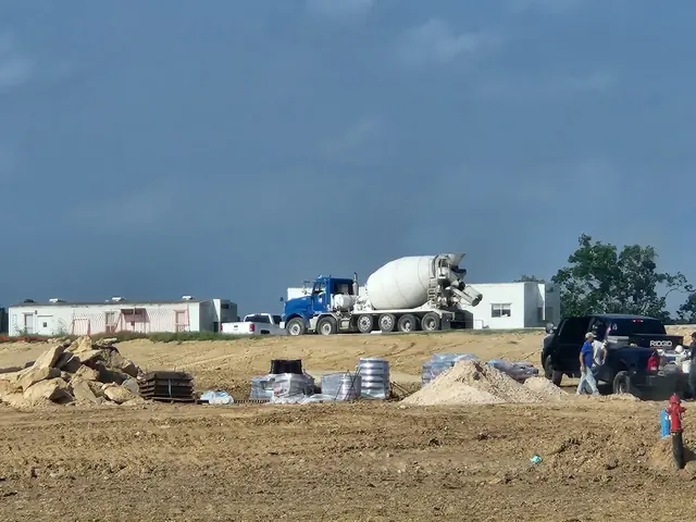 Nikky ready mix truck on a commercial job site
