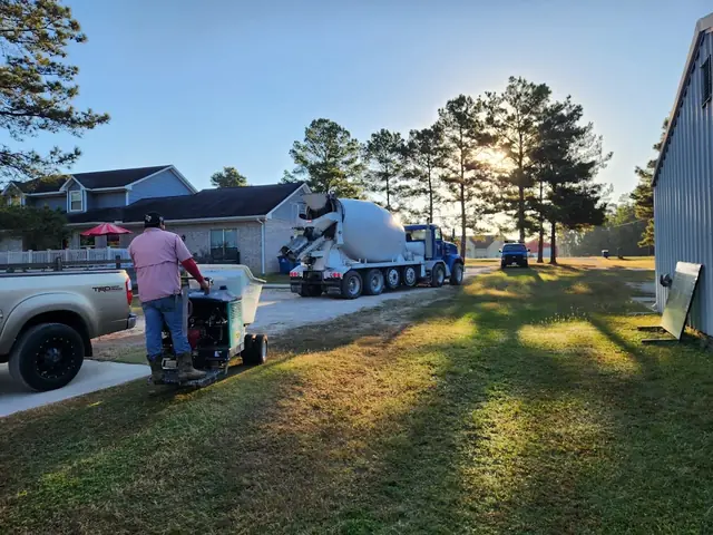 Power trowel finish work at golden hour