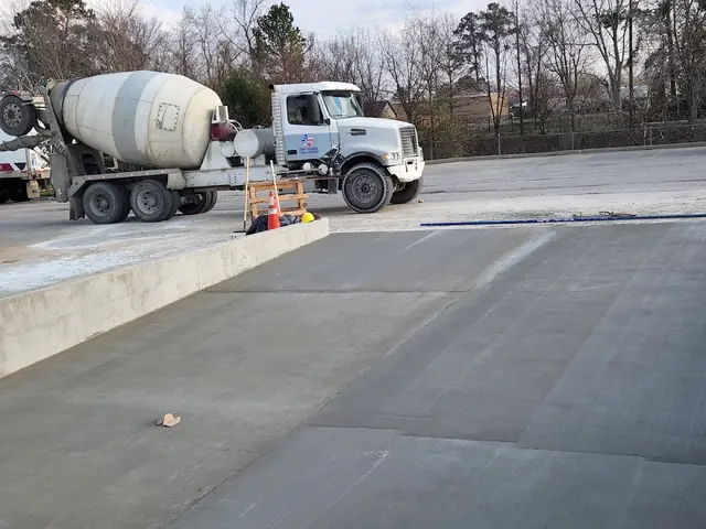 Ready mix truck delivering concrete at golden hour